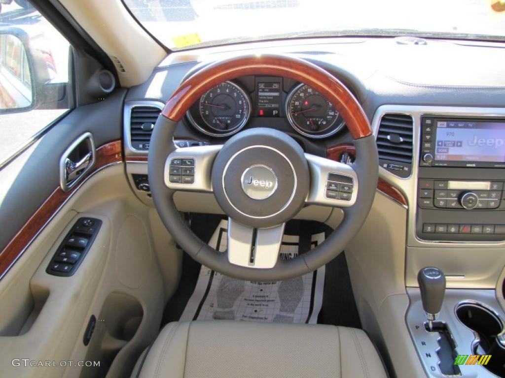 2011 Jeep Grand Cherokee Overland 4x4 Dark Frost Beige/Light Frost Beige Dashboard Photo #41141715