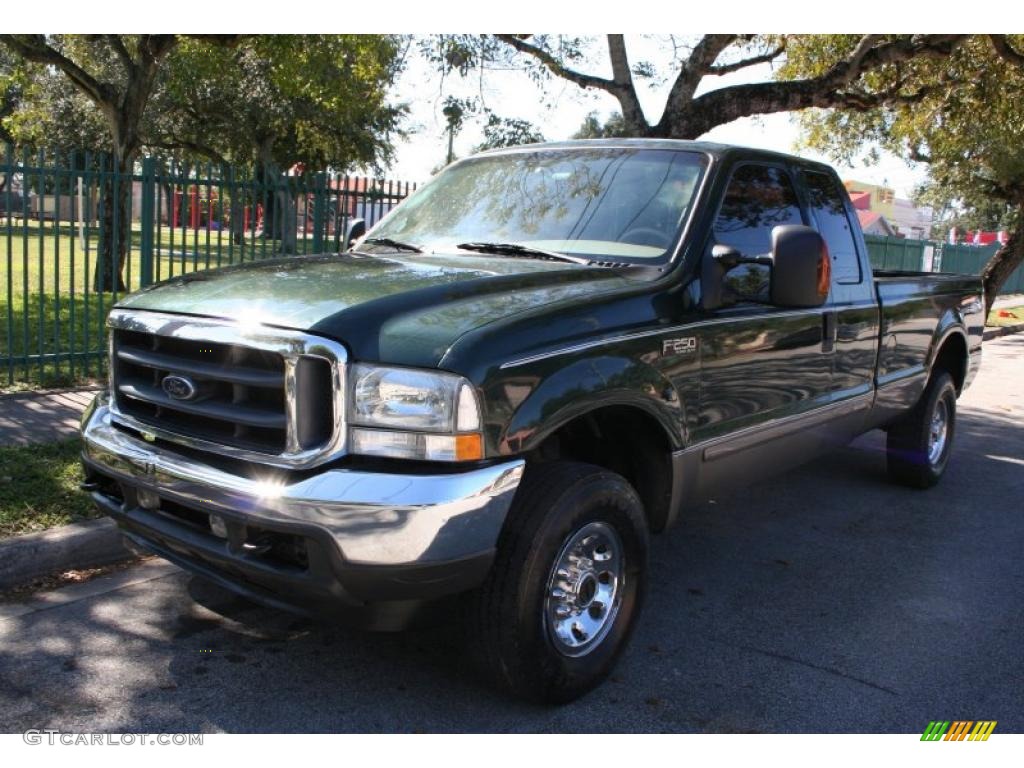 2003 F250 Super Duty Lariat SuperCab 4x4 - Dark Highland Green Metallic / Medium Parchment Beige photo #1