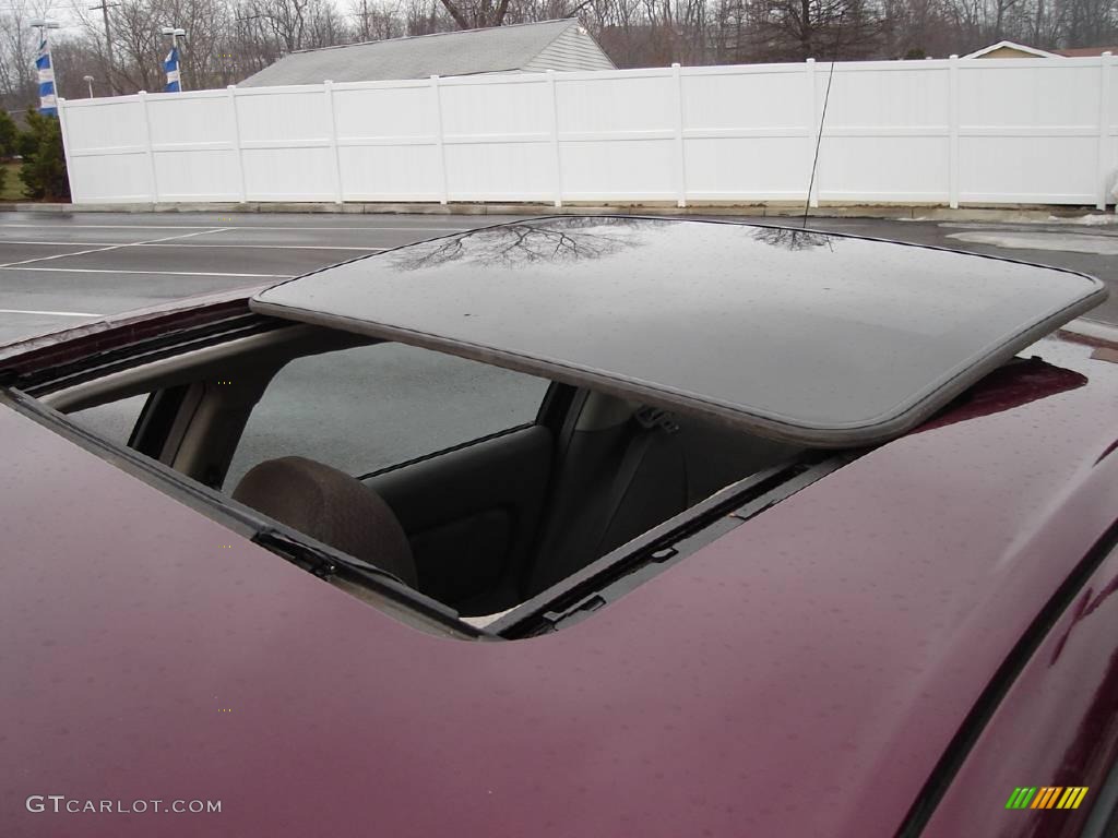 2001 Stratus SE Sedan - Dark Garnet Red Pearl / Taupe photo #9