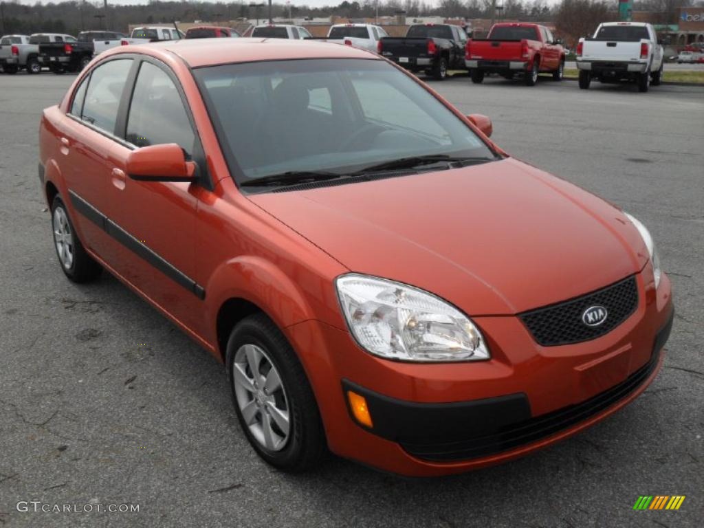 Sunset Orange 2009 Kia Rio LX Sedan Exterior Photo #41187462