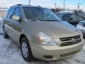 2006 Sunset Gold Kia Sedona LX  photo #1