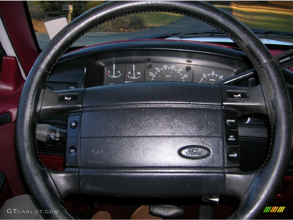 1996 Ford F150 XLT Extended Cab Ruby Red Steering Wheel Photo #41225487