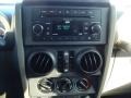 2010 Jeep Wrangler Unlimited Dark Khaki/Medium Khaki Interior Controls Photo