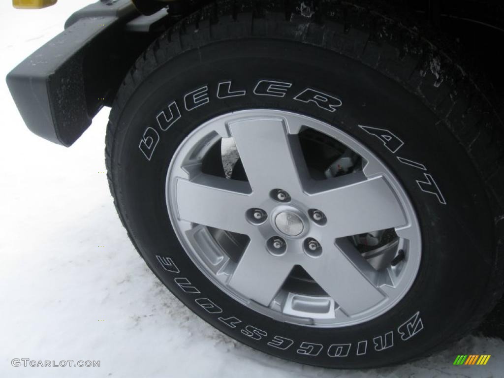 2011 Jeep Wrangler Unlimited Sahara 4x4 Wheel Photo #41249729