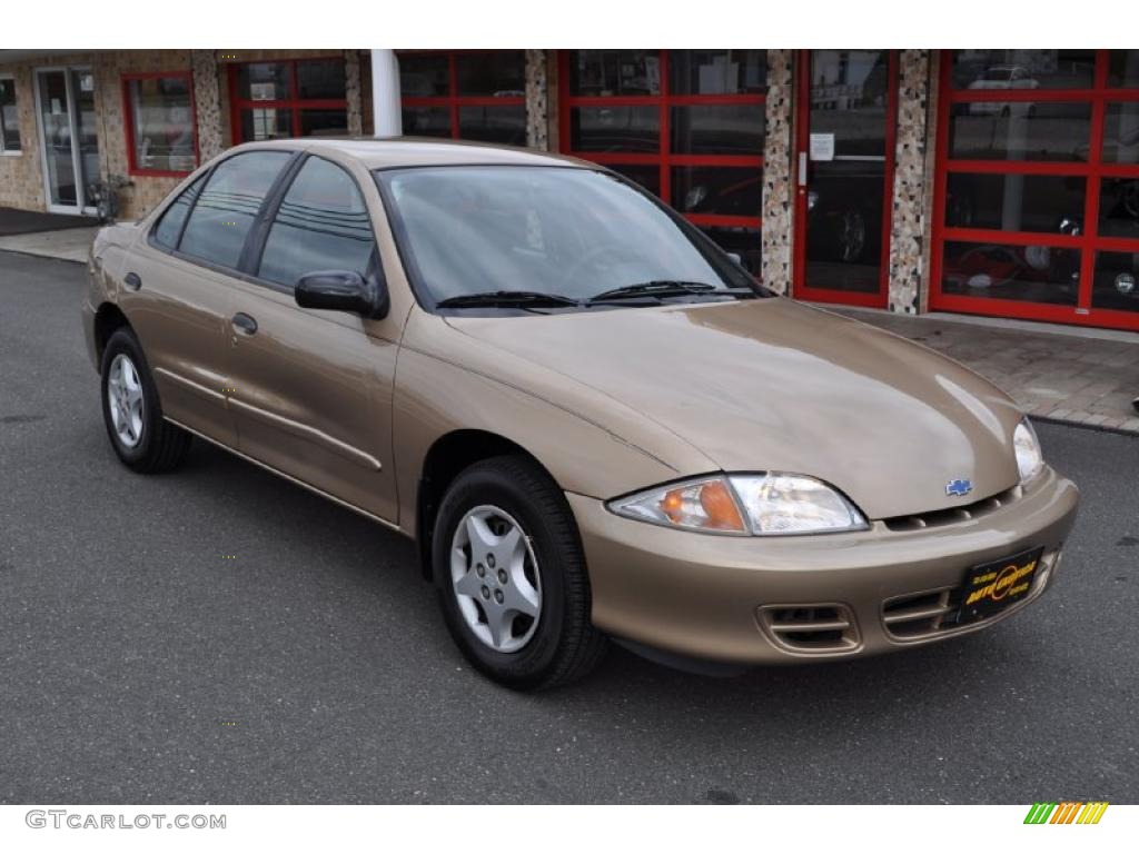 2000 Cavalier Sedan - Medium Sunset Gold Metallic / Graphite photo #1