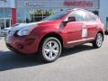 2011 Cayenne Red Nissan Rogue SV  photo #1