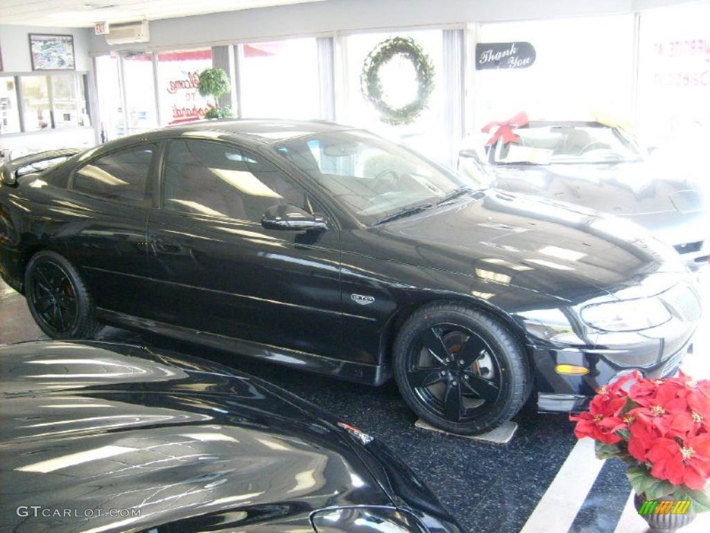 2004 GTO Coupe - Phantom Black Metallic / Red photo #5