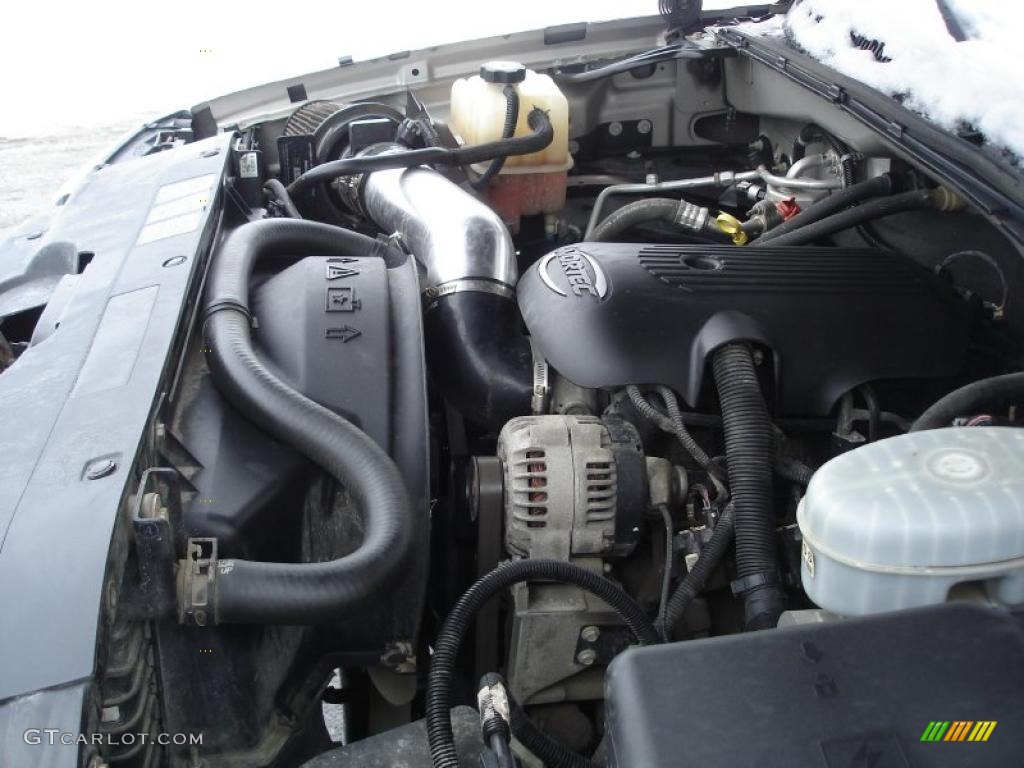 2004 Silverado 1500 LS Extended Cab 4x4 - Sandstone Metallic / Dark Charcoal photo #17