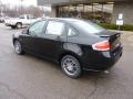 2011 Ebony Black Ford Focus SE Sedan  photo #2