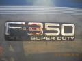 2002 Ford F350 Super Duty XLT Crew Cab Dually Badge and Logo Photo