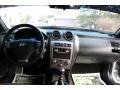 2008 Hyundai Tiburon SE Red Leather/Black Sport Grip Interior Dashboard Photo