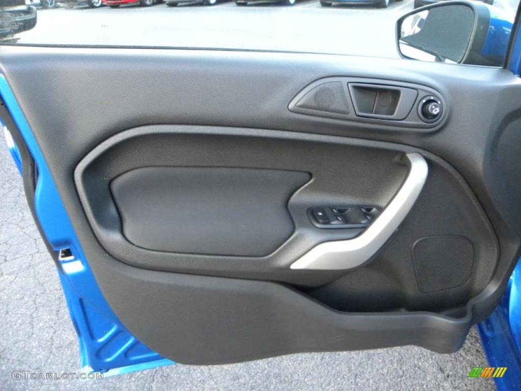 2011 Ford Fiesta SE Sedan Charcoal Black/Blue Cloth Door Panel Photo #41436151