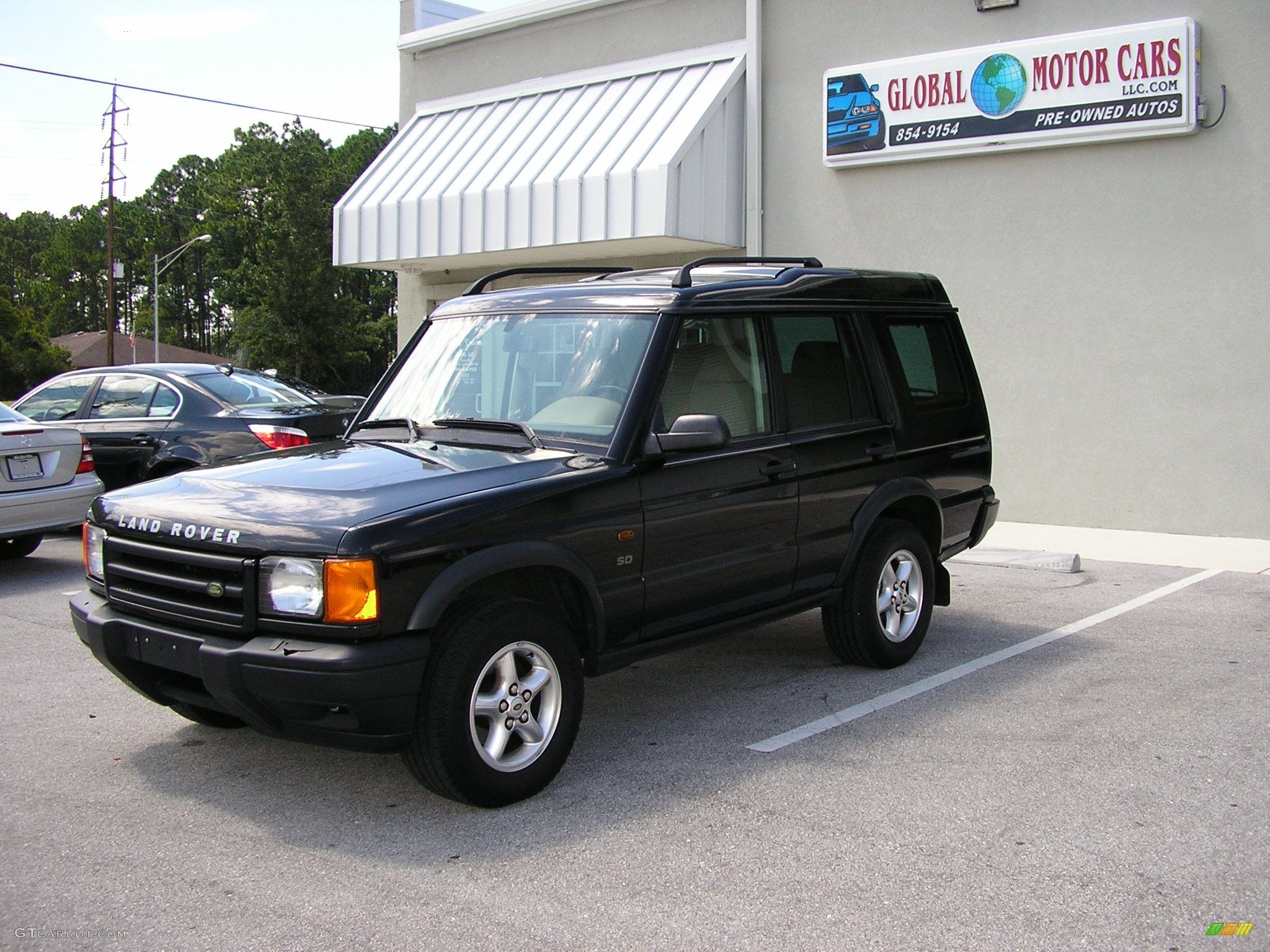 2001 Discovery SD - Russ Black Metallic / Bahama Beige photo #1