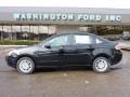 2011 Ebony Black Ford Focus SE Sedan  photo #1