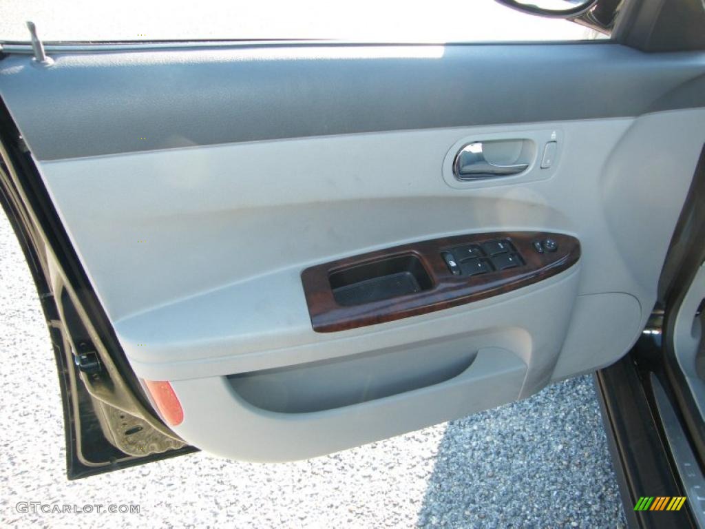 2007 Buick LaCrosse CX Gray Door Panel Photo #41511673