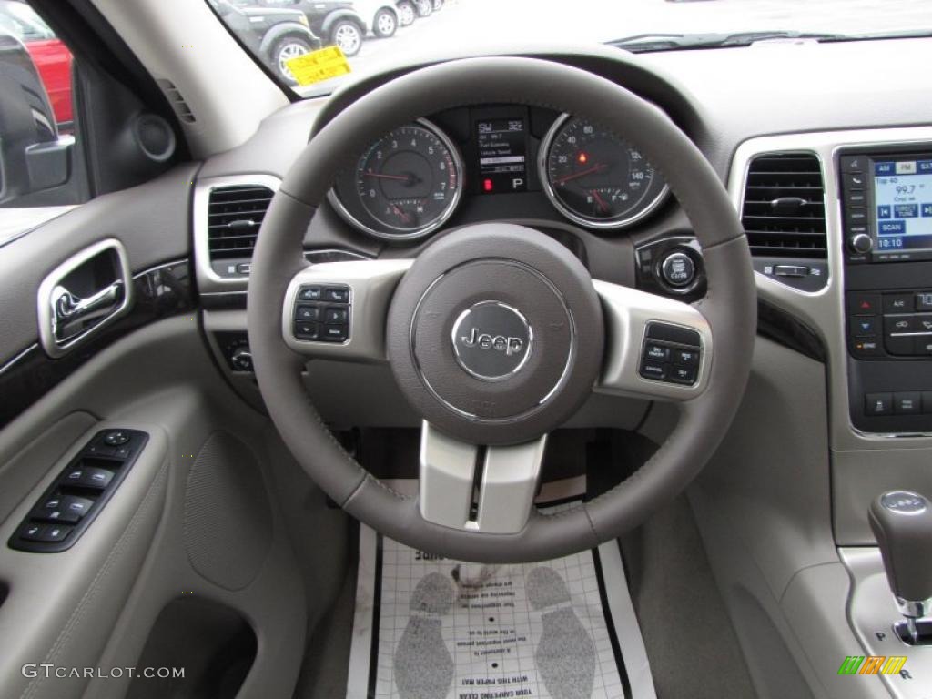 2011 Jeep Grand Cherokee Laredo X Package Dark Graystone/Medium Graystone Steering Wheel Photo #41563551