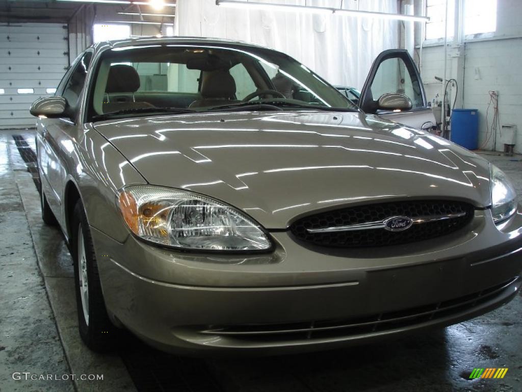 Arizona Beige Metallic Ford Taurus