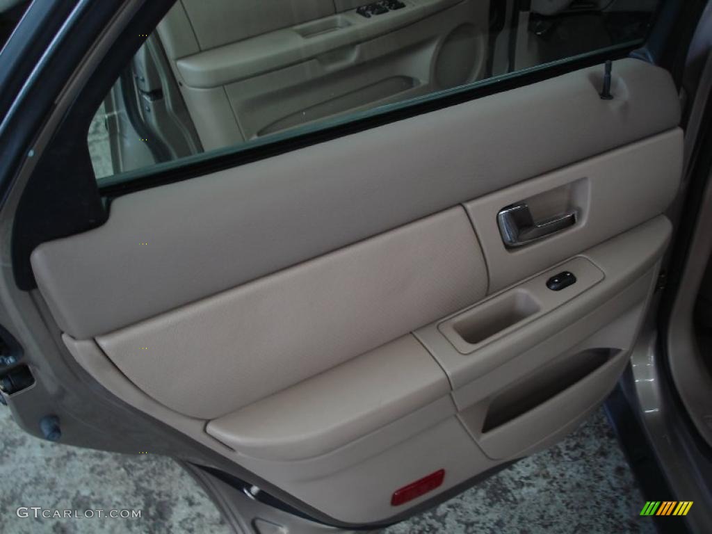 2003 Taurus SES - Arizona Beige Metallic / Medium Parchment photo #11