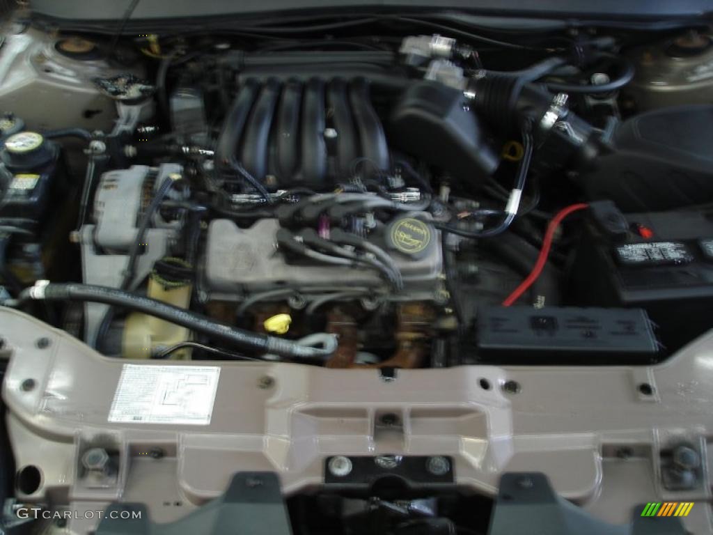 2003 Taurus SES - Arizona Beige Metallic / Medium Parchment photo #19