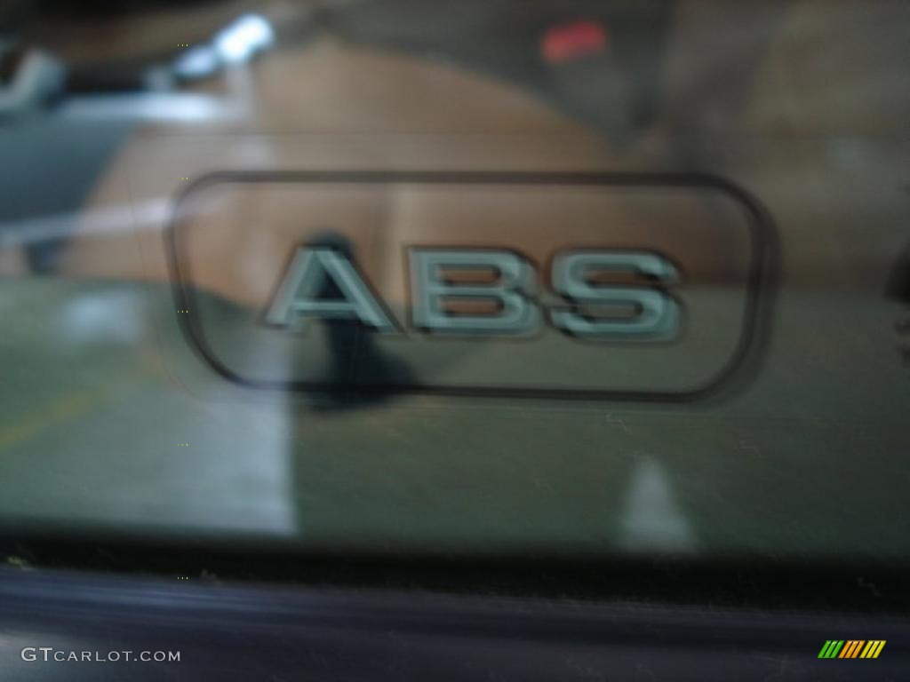 2003 Taurus SES - Arizona Beige Metallic / Medium Parchment photo #21