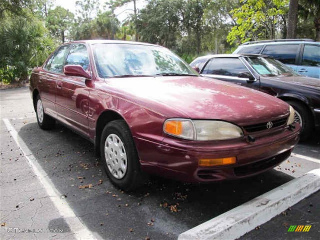 1996 Camry LE Sedan - Ruby Red Pearl / Gray photo #1