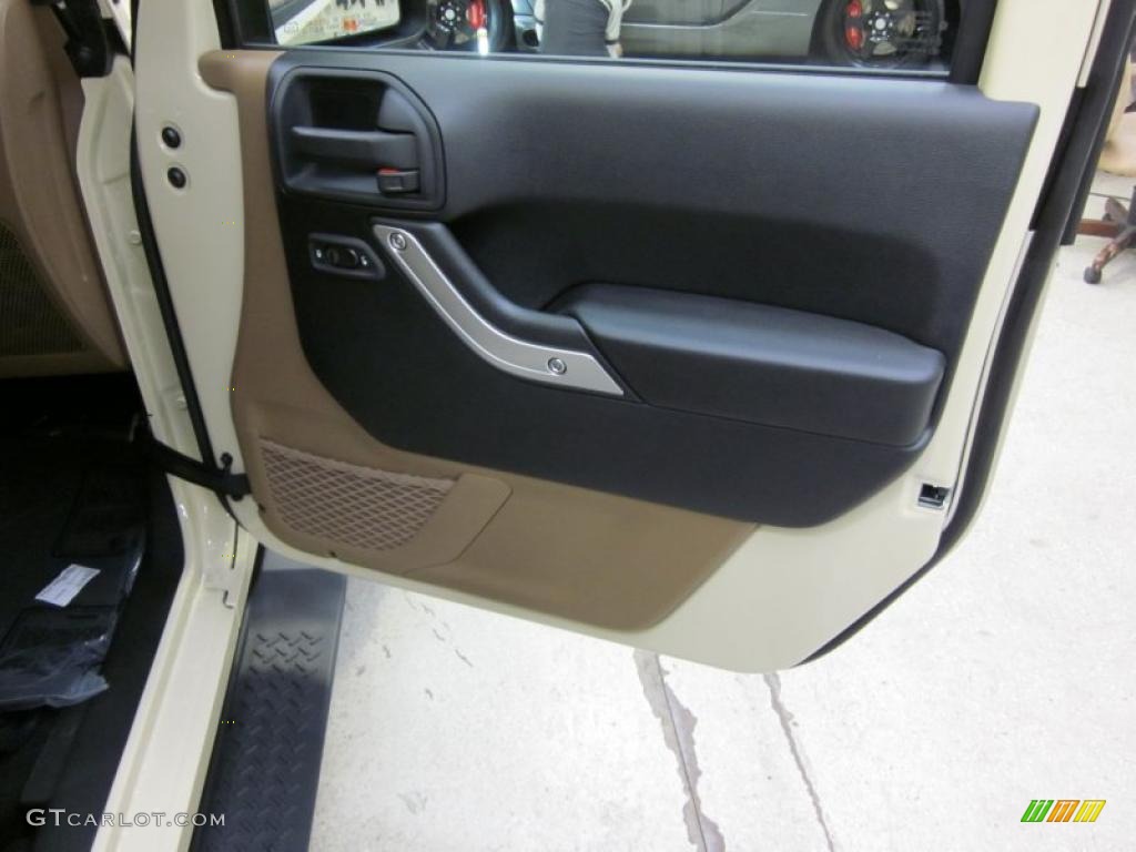 2011 Jeep Wrangler Unlimited Sahara 4x4 Black/Dark Saddle Door Panel Photo #41575491