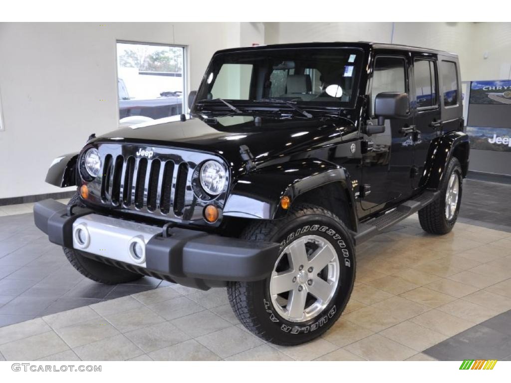 Black 2009 Jeep Wrangler Unlimited Sahara 4x4 Exterior Photo #41602601