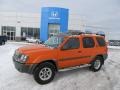 2003 Atomic Orange Nissan Xterra XE V6 4x4  photo #1