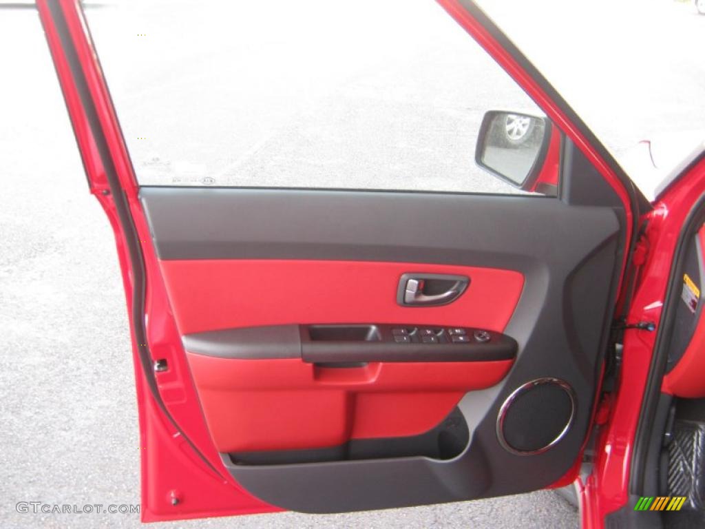 2011 Kia Soul Sport Red/Black Sport Cloth Door Panel Photo #41641415