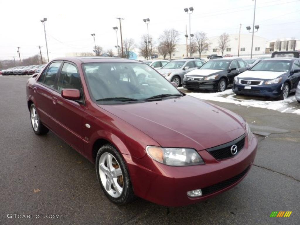 2003 Protege ES - Garnet Red Mica / Off Black photo #5