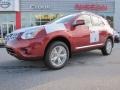 2011 Cayenne Red Nissan Rogue SV  photo #1