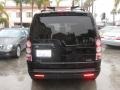 2010 Santorini Black Land Rover LR4 HSE Lux  photo #3