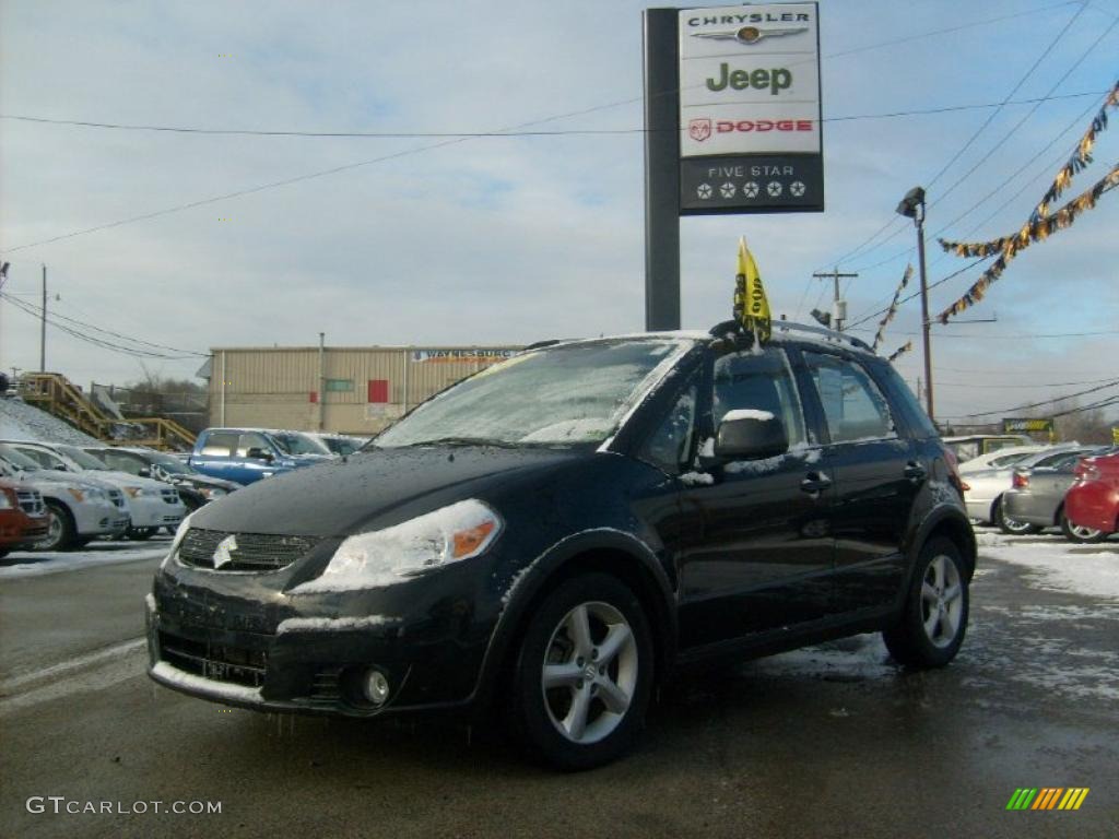 2009 SX4 Crossover Touring AWD - Black Pearl Metallic / Black photo #1