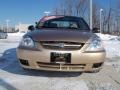 2003 Light Gold Kia Rio Sedan  photo #2