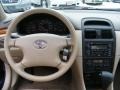 Ivory 2003 Toyota Solara SLE V6 Coupe Dashboard