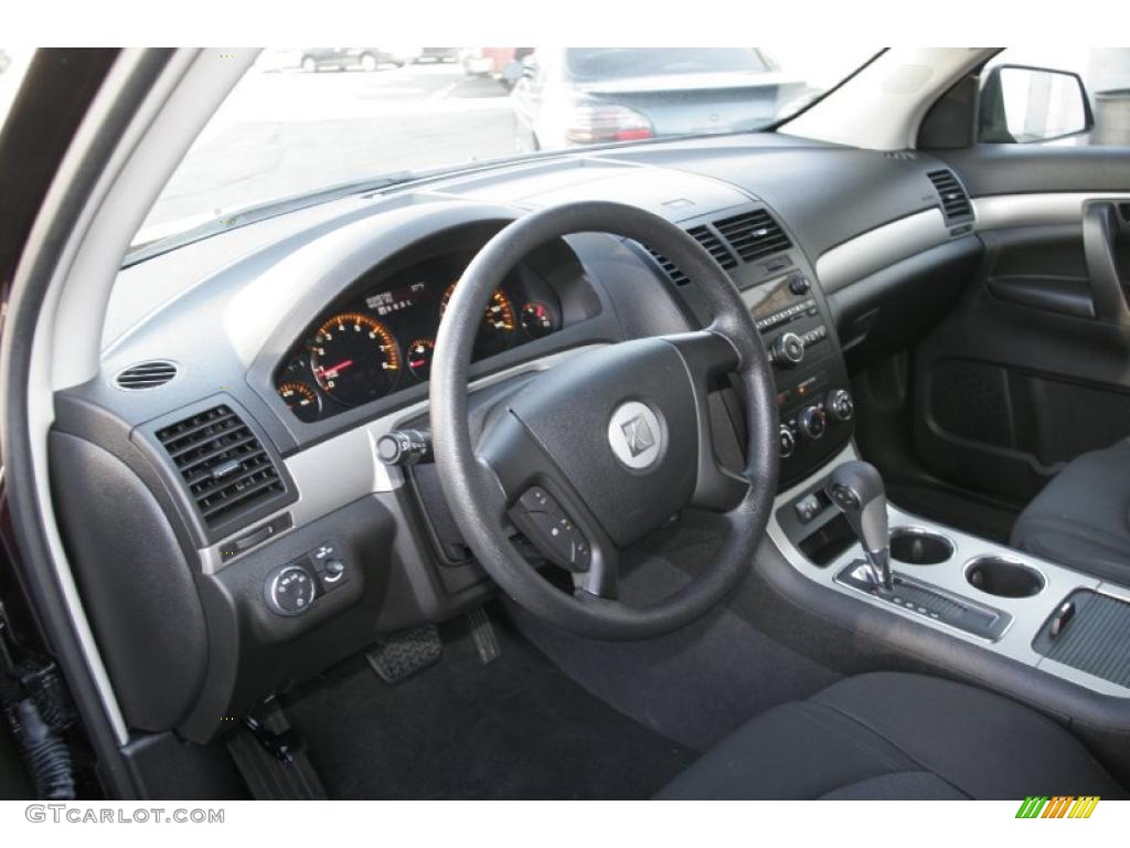 2009 Outlook XE AWD - Garnet Red / Black photo #11