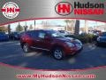 2011 Cayenne Red Nissan Rogue SV  photo #1