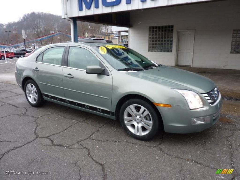 2009 Fusion SEL V6 - Moss Green Metallic / Medium Light Stone photo #2