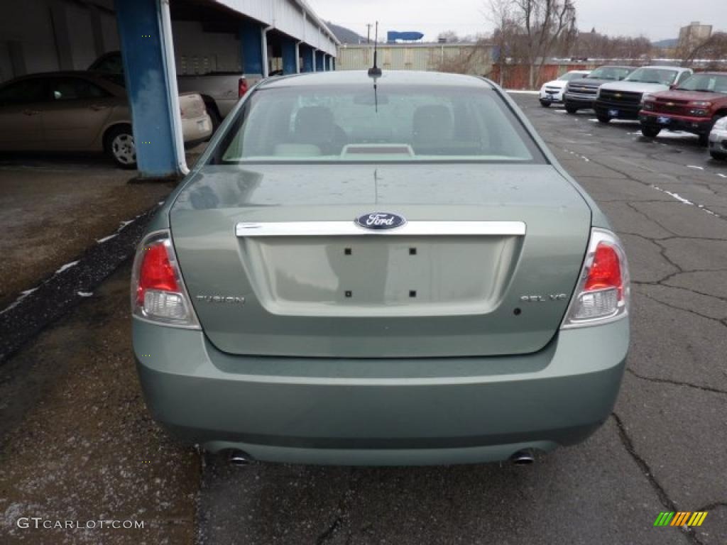 2009 Fusion SEL V6 - Moss Green Metallic / Medium Light Stone photo #9