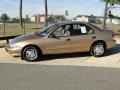 1998 Gold Metallic Chevrolet Cavalier LS Sedan  photo #9