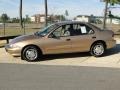 Gold Metallic - Cavalier LS Sedan Photo No. 9