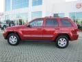 2010 Inferno Red Crystal Pearl Jeep Grand Cherokee Laredo  photo #2