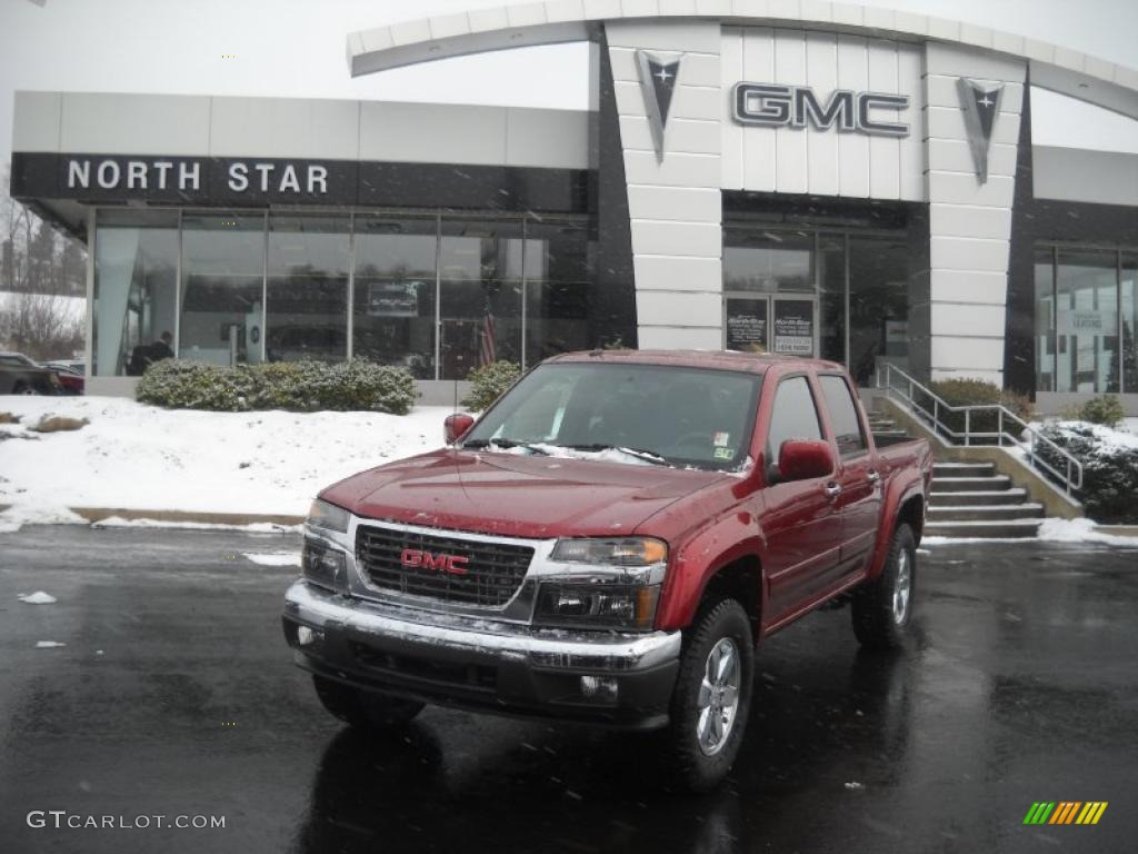 2011 Canyon SLE Crew Cab 4x4 - Merlot Jewel Red Metallic / Ebony photo #1