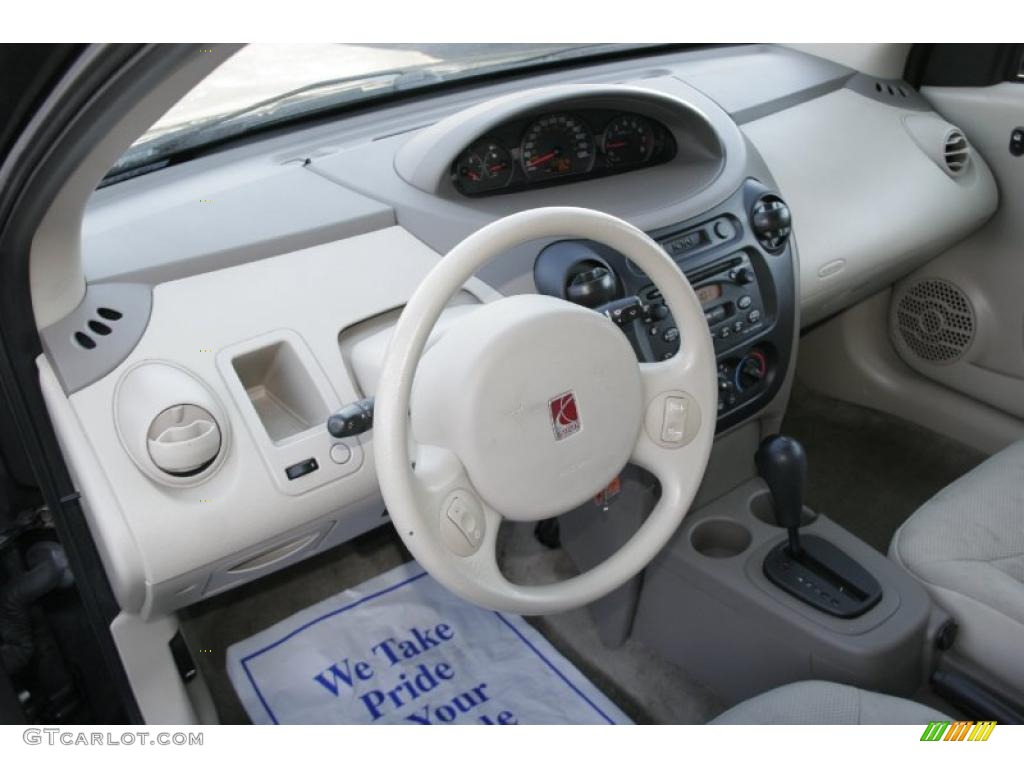 Tan Interior 2003 Saturn ION 2 Sedan Photo #41789513