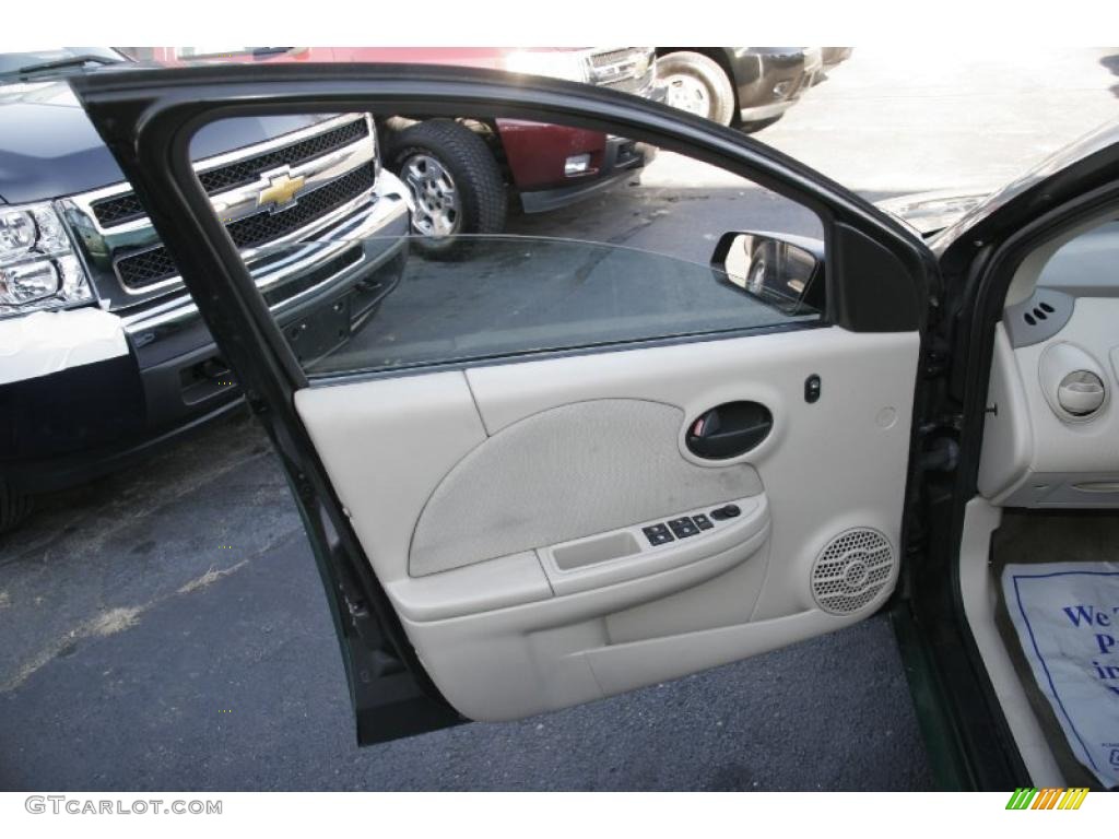 2003 Saturn ION 2 Sedan Tan Door Panel Photo #41789529
