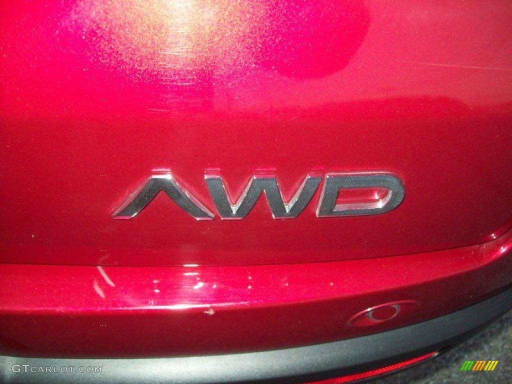 2007 Outlook XR AWD - Red Jewel / Black photo #31