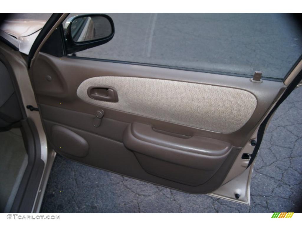 1997 Toyota Corolla CE Beige Door Panel Photo #41802395