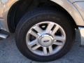 2004 Ford F150 XLT SuperCab Wheel and Tire Photo