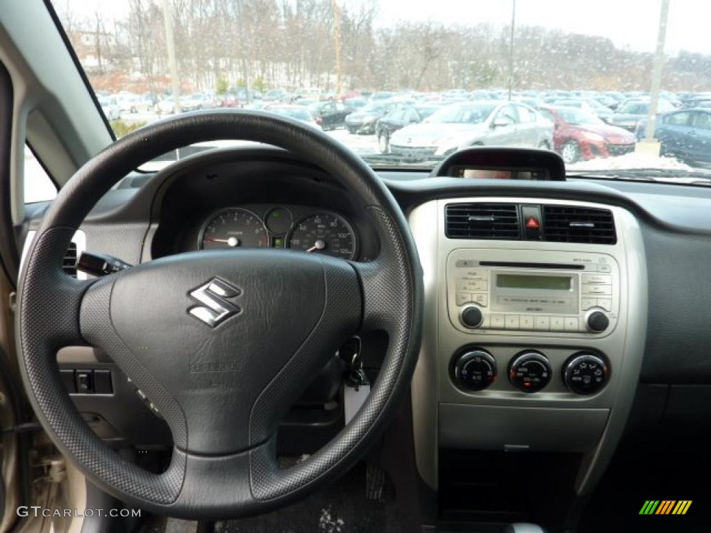 2006 Aerio AWD Sedan - Cool Beige Metallic / Black photo #10