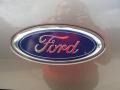 2003 Ford Explorer XLS Badge and Logo Photo